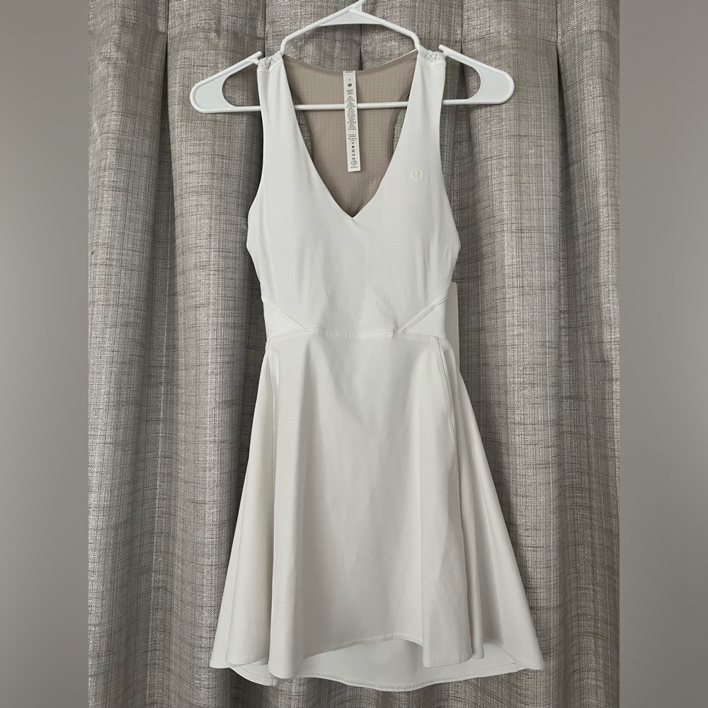 Lululemon tennis dress. V neck, cut out back, built in sports bra.